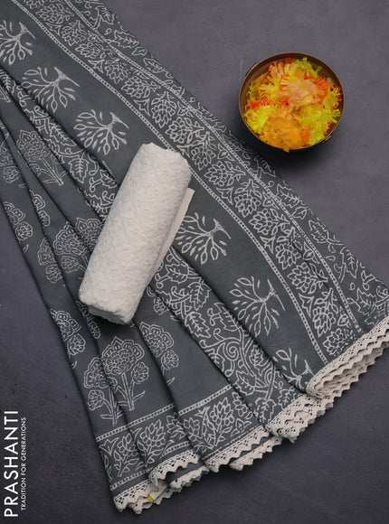 Semi pashmina silk saree grey shade and cream with allover floral butta prints and crocia lace work border