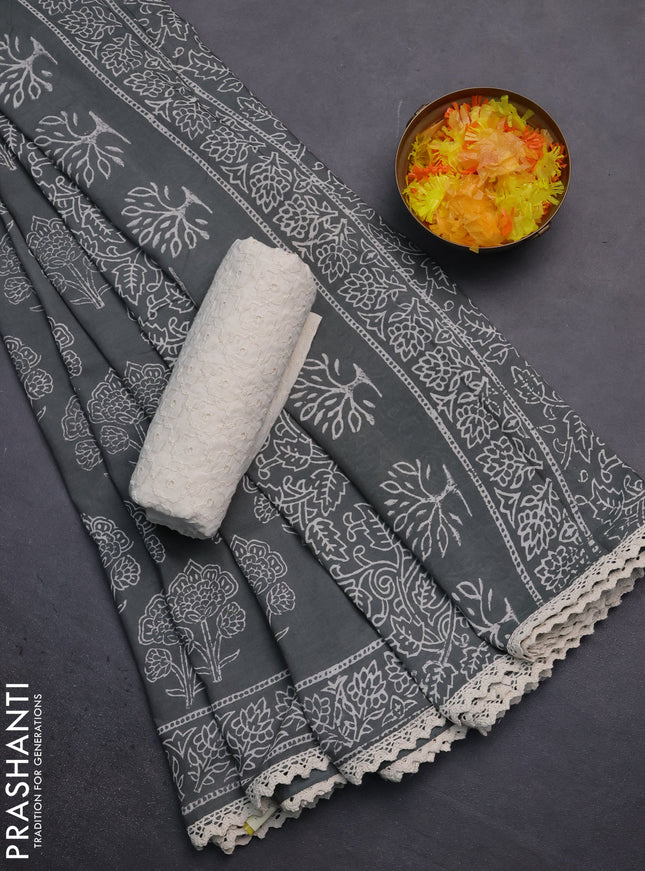 Semi pashmina silk saree grey shade and cream with allover floral butta prints and crocia lace work border