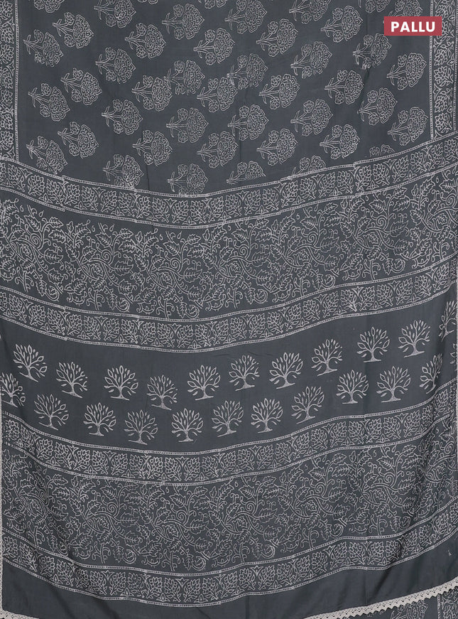 Semi pashmina silk saree grey shade and cream with allover floral butta prints and crocia lace work border