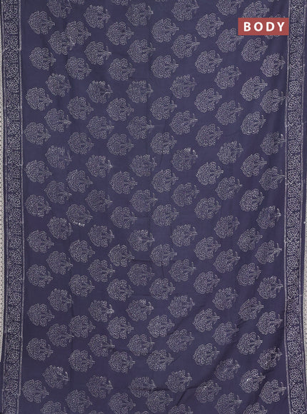 Semi pashmina silk saree grey and cream with allover floral butta prints and crocia lace work border