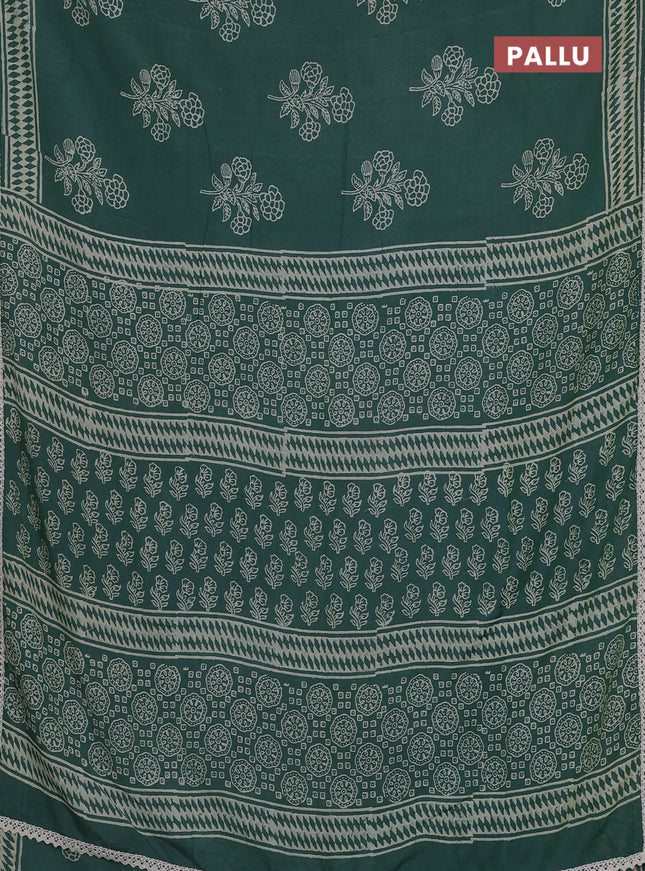 Semi pashmina silk saree green and cream with butta prints and crocia lace work border