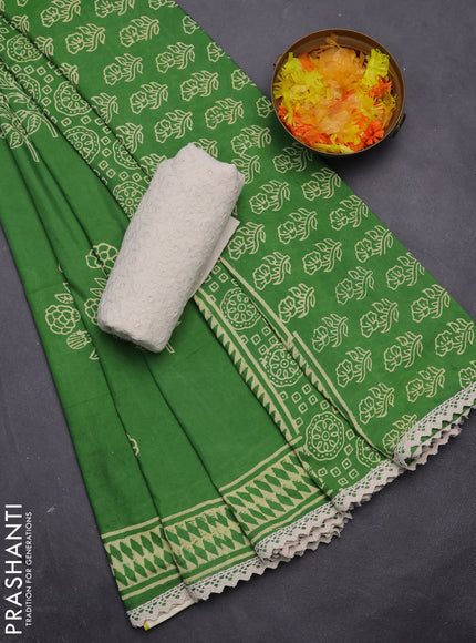 Semi pashmina silk saree green and cream with butta prints and crocia lace work border