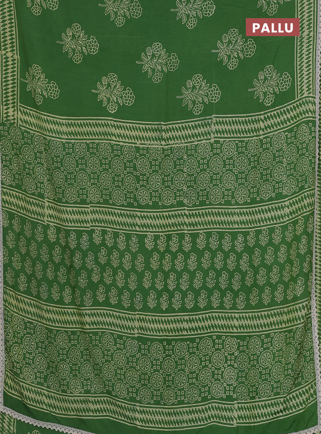 Semi pashmina silk saree green and cream with butta prints and crocia lace work border