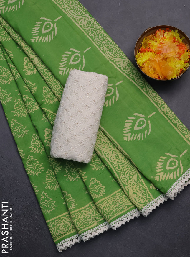 Semi pashmina silk saree light green and cream with allover butta prints and crocia lace work border