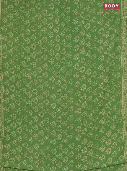 Semi pashmina silk saree light green and cream with allover butta prints and crocia lace work border