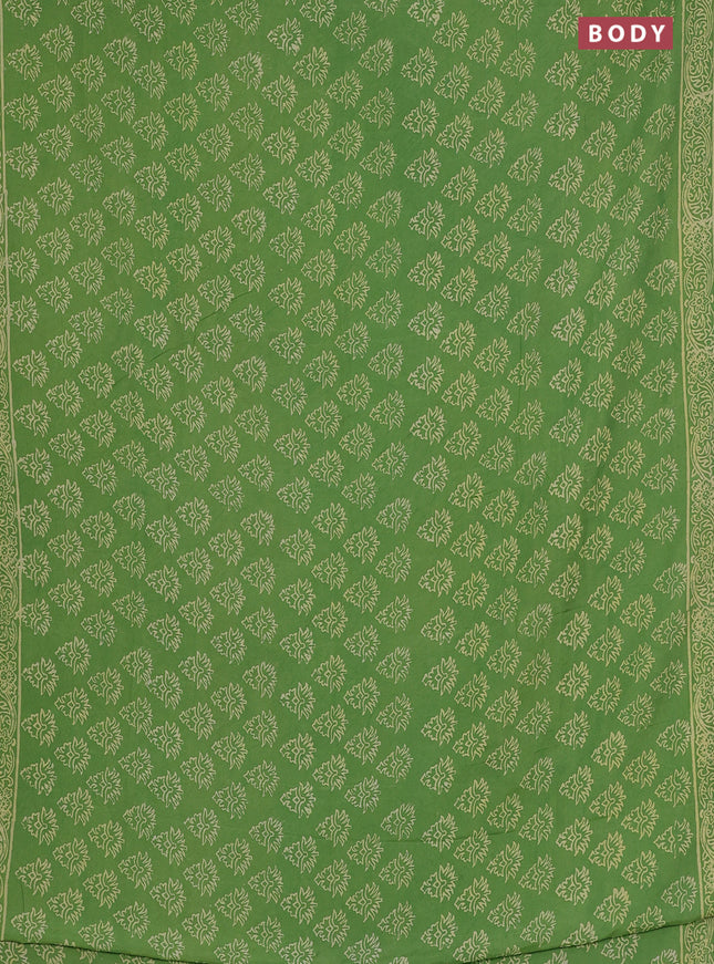 Semi pashmina silk saree light green and cream with allover butta prints and crocia lace work border