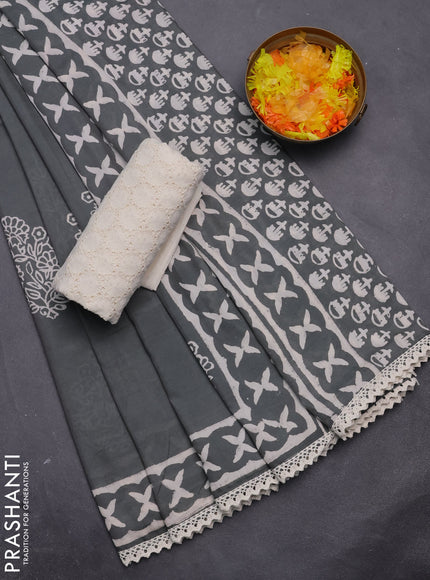 Semi pashmina silk saree grey and cream with floral butta prints and crocia lace work border
