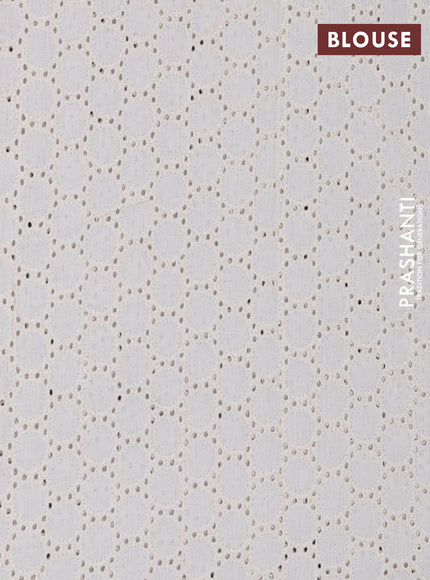 Semi pashmina silk saree grey and cream with floral butta prints and crocia lace work border