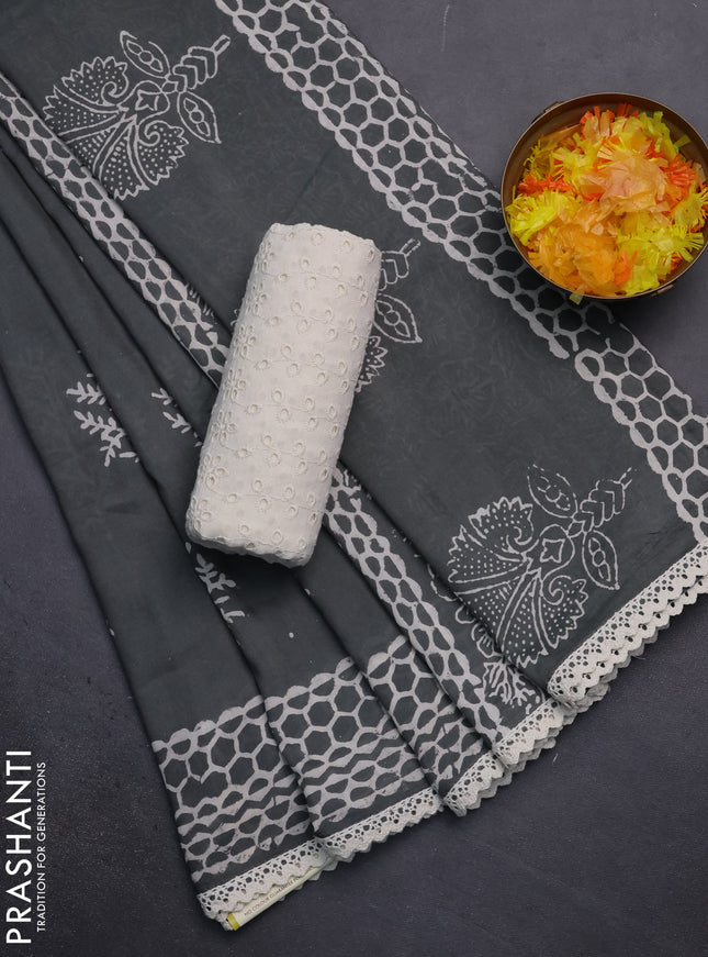 Semi pashmina silk saree grey and cream with tree butta prints and crocia lace work border