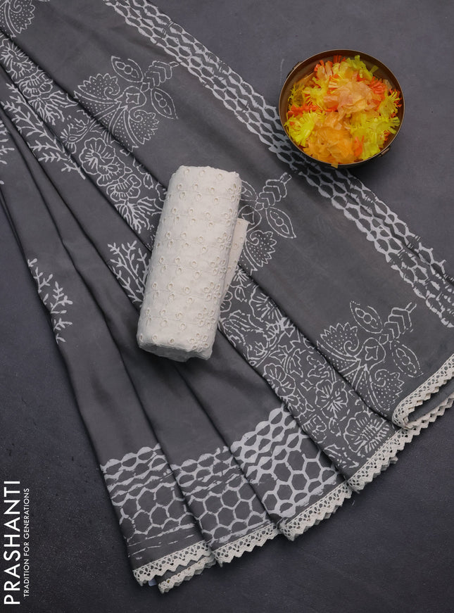 Semi pashmina silk saree grey and cream with tree butta prints and crocia lace work border