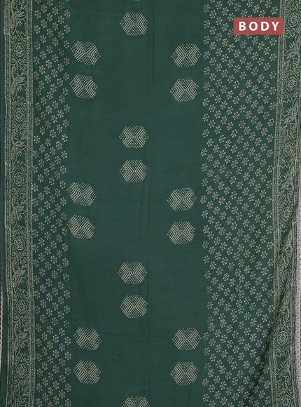 Semi pashmina silk saree green shade and cream with butta prints and crocia lace work border