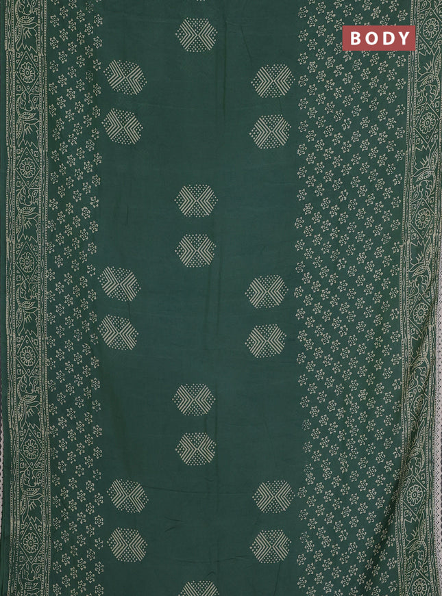 Semi pashmina silk saree green shade and cream with butta prints and crocia lace work border