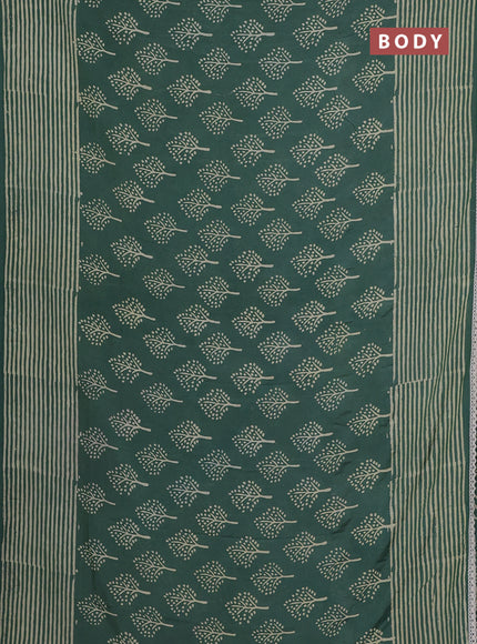 Semi pashmina silk saree pastel green and cream with allover tree butta prints and crocia lace work border