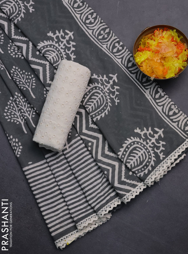 Semi pashmina silk saree grey and cream with allover tree butta prints and crocia lace work border