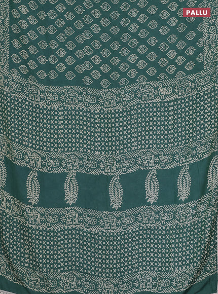 Semi pashmina silk saree teal green shade and cream with allover butta prints and crocia lace work border