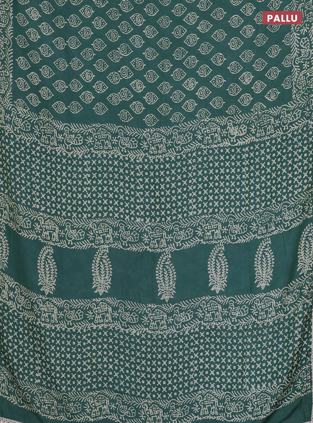 Semi pashmina silk saree teal green shade and cream with allover butta prints and crocia lace work border