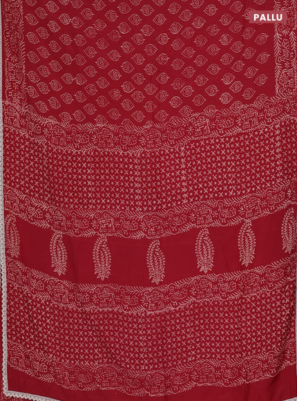 Semi pashmina silk saree maroon and cream with allover butta prints and crocia lace work border