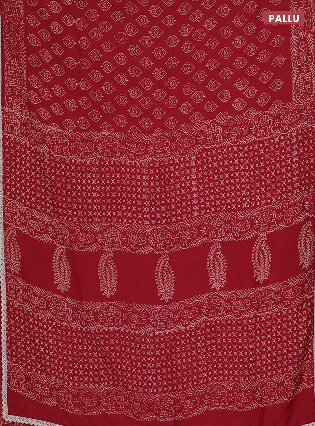 Semi pashmina silk saree maroon and cream with allover butta prints and crocia lace work border