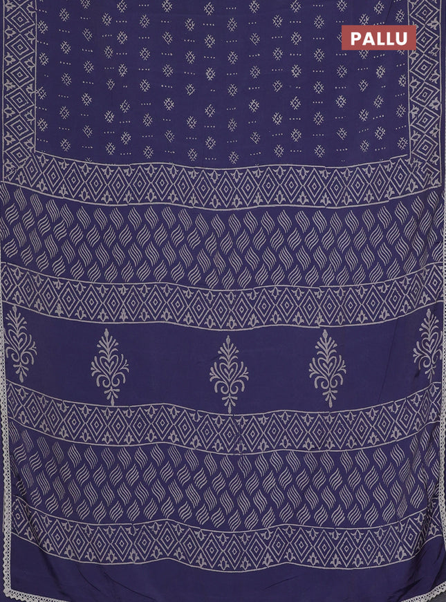 Semi pashmina silk saree blue shade and cream with allover butta prints and crocia lace work border