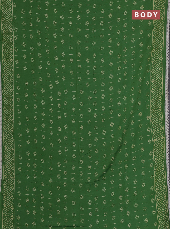 Semi pashmina silk saree green and cream with allover butta prints and crocia lace work border