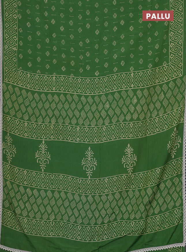 Semi pashmina silk saree green and cream with allover butta prints and crocia lace work border