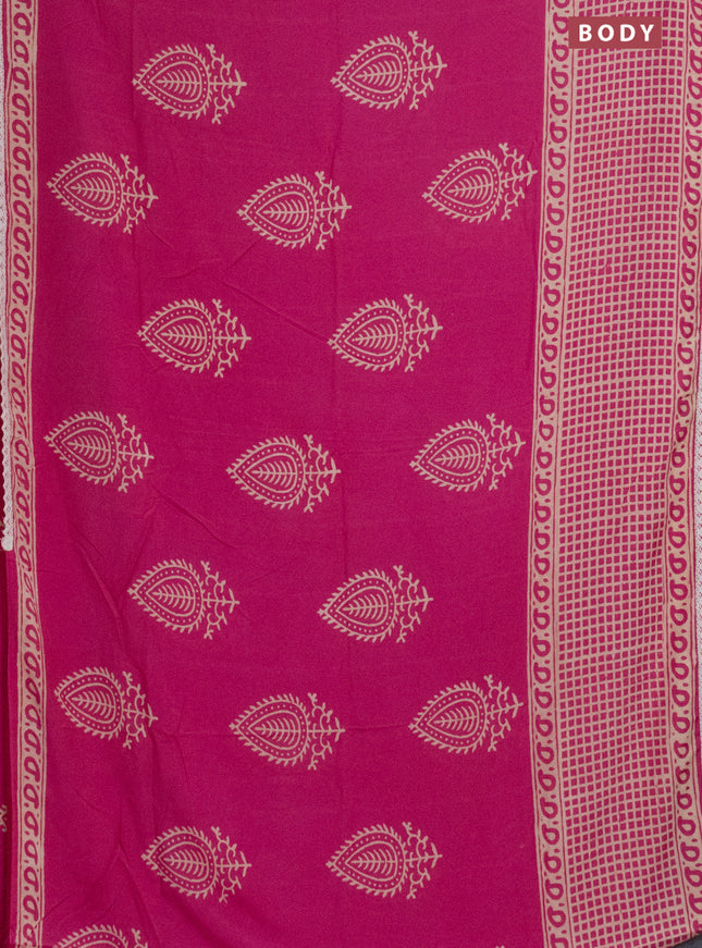 Semi pashmina silk saree pink and cream with butta prints and long printed crocia lace work border
