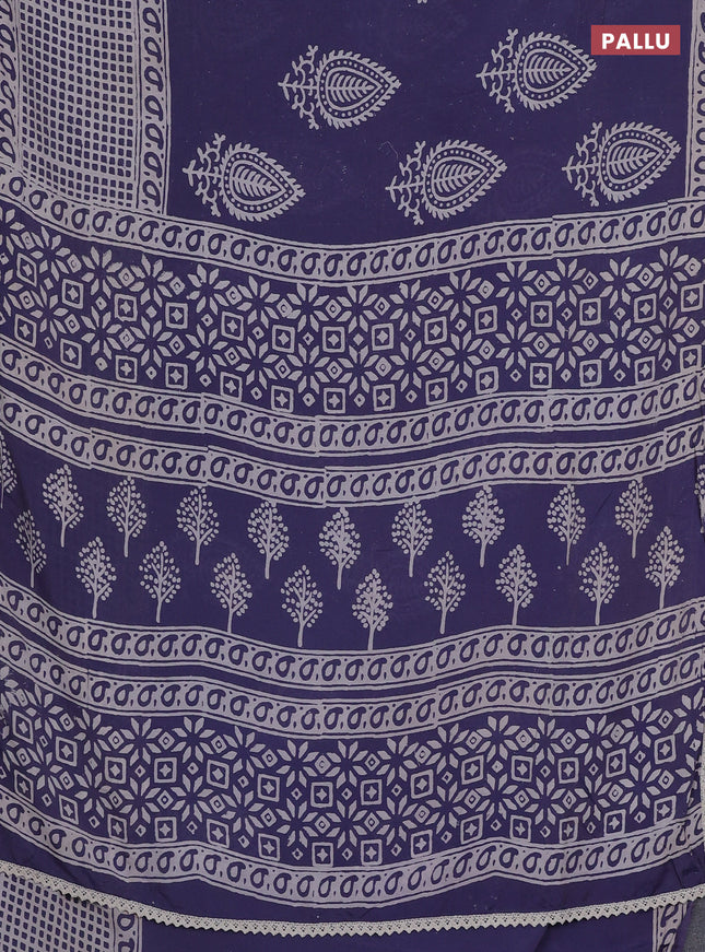 Semi pashmina silk saree blue shade and cream with butta prints and long printed crocia lace work border