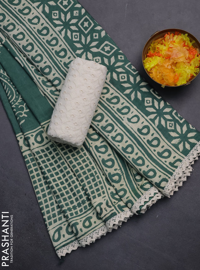 Semi pashmina silk saree teal green shade and cream with butta prints and long printed crocia lace work border