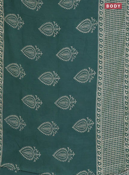 Semi pashmina silk saree teal green shade and cream with butta prints and long printed crocia lace work border