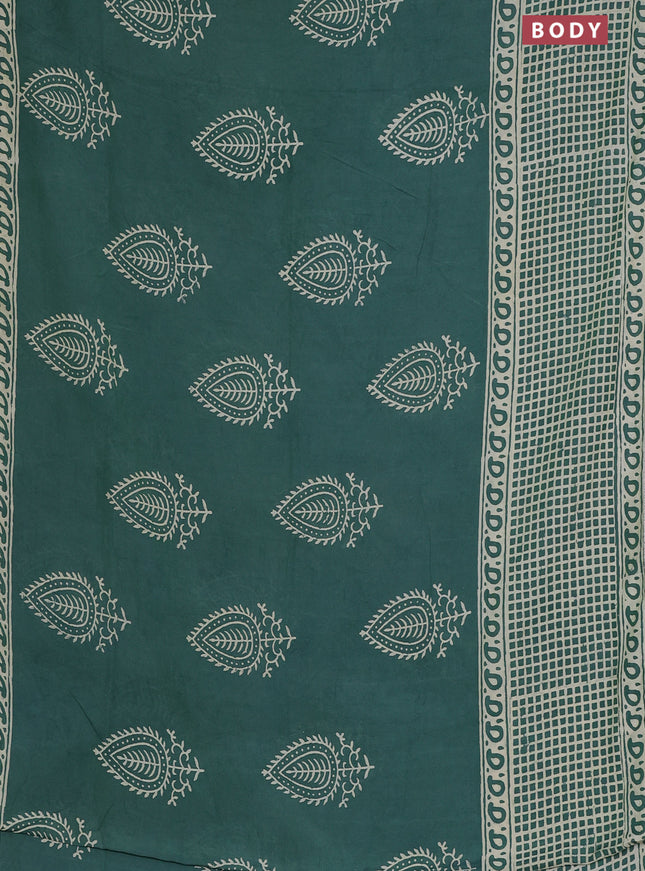 Semi pashmina silk saree teal green shade and cream with butta prints and long printed crocia lace work border