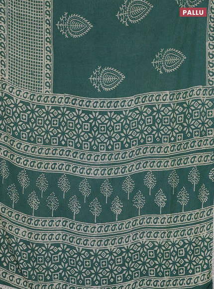 Semi pashmina silk saree teal green shade and cream with butta prints and long printed crocia lace work border