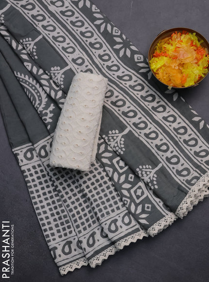 Semi pashmina silk saree grey and cream with butta prints and long printed crocia lace work border
