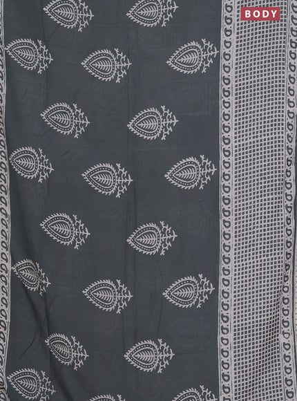 Semi pashmina silk saree grey and cream with butta prints and long printed crocia lace work border