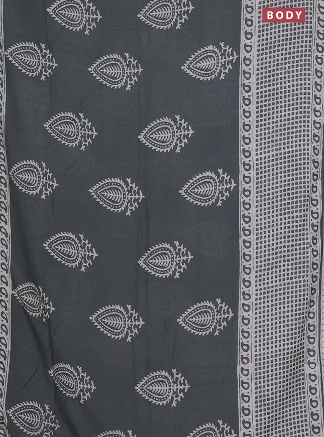 Semi pashmina silk saree grey and cream with butta prints and long printed crocia lace work border