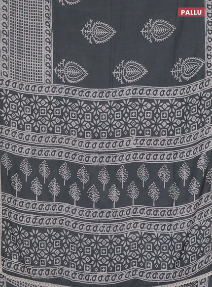 Semi pashmina silk saree grey and cream with butta prints and long printed crocia lace work border