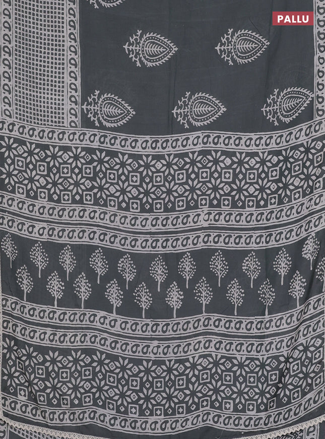 Semi pashmina silk saree grey and cream with butta prints and long printed crocia lace work border
