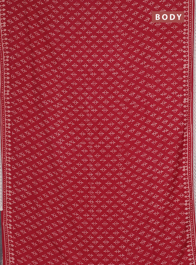 Semi pashmina silk saree red and cream with butta prints and crocia lace work border
