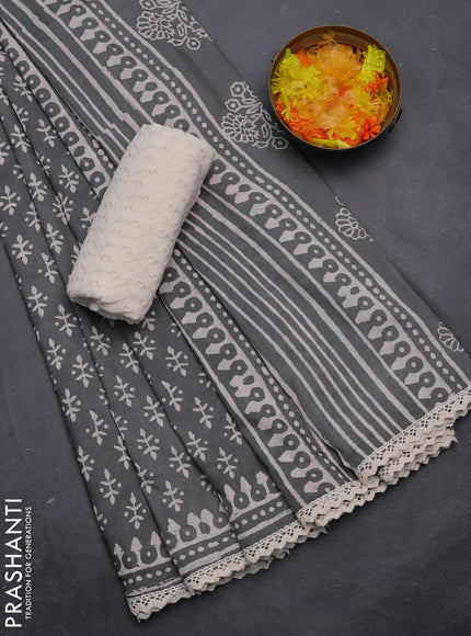 Semi pashmina silk saree grey and cream with butta prints and crocia lace work border