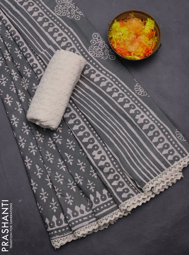 Semi pashmina silk saree grey and cream with butta prints and crocia lace work border