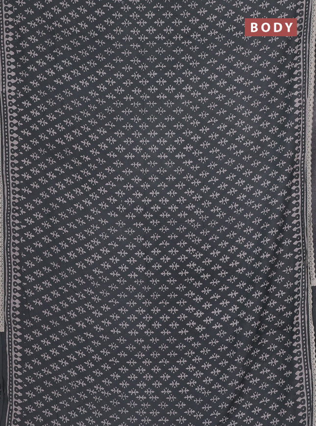 Semi pashmina silk saree grey and cream with butta prints and crocia lace work border