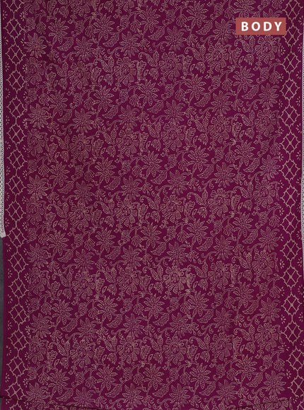 Semi pashmina silk saree pueple and cream with allover prints and crocia lace work border