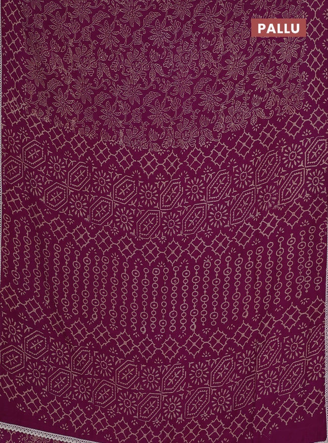 Semi pashmina silk saree pueple and cream with allover prints and crocia lace work border