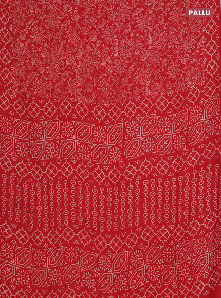 Semi pashmina silk saree red and cream with allover prints and crocia lace work border