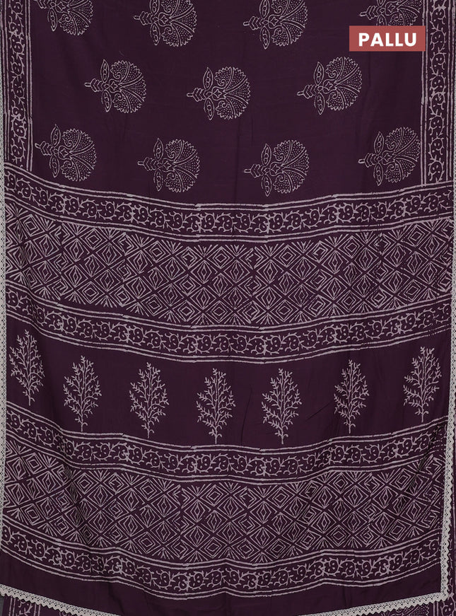 Semi pashmina silk saree wine shade and cream with butta prints and crocia lace work border
