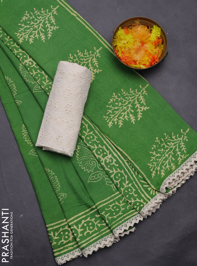 Semi pashmina silk saree green and cream with butta prints and crocia lace work border