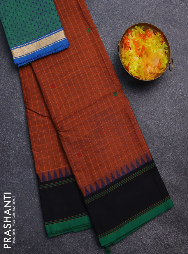 Chettinad cotton saree rust shade and green with allover checked pattern & thread buttas and simple border