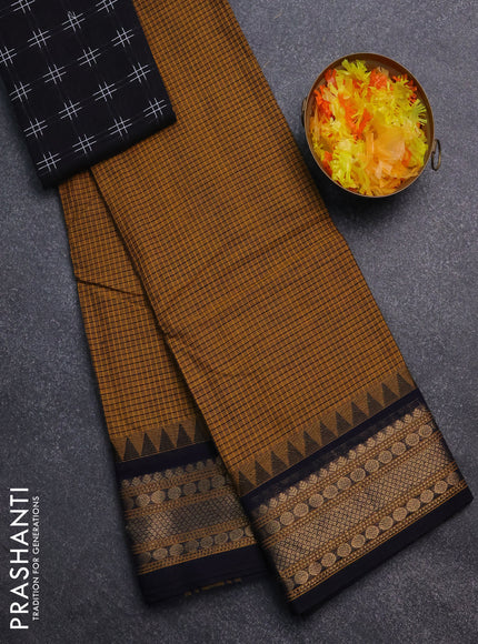 Chettinad cotton saree mustard shade and navy blue with allover checked pattern and temple disign zari woven border