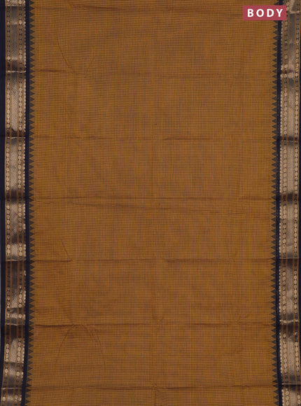 Chettinad cotton saree mustard shade and navy blue with allover checked pattern and temple disign zari woven border