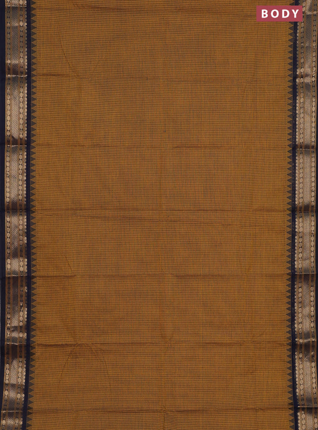 Chettinad cotton saree mustard shade and navy blue with allover checked pattern and temple disign zari woven border