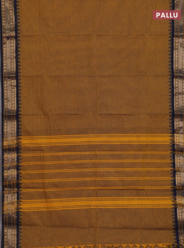 Chettinad cotton saree mustard shade and navy blue with allover checked pattern and temple disign zari woven border